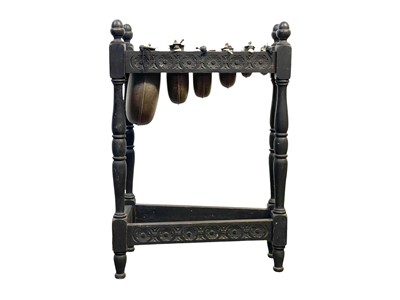 Lot 31 - An oak framed xylophone or metallophone.