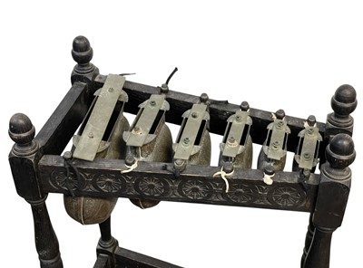 Lot 31 - An oak framed xylophone or metallophone.