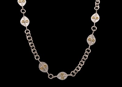Lot 109 - GUY ROYLE - A silver and yellow metal applied necklace.