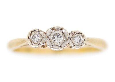 Lot 108 - A 9ct hallmarked gold diamond set three-stone ring.