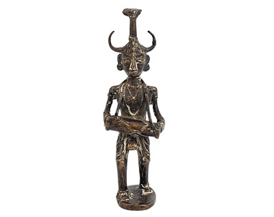Lot 53 - An Indian cast bronze figure of a musician.