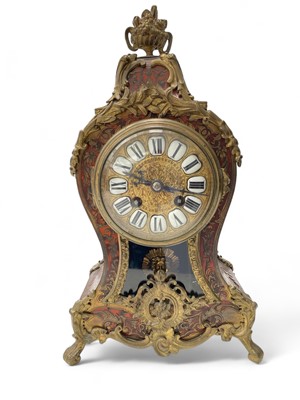 Lot 1645 - A red boulle clock
