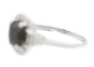 Lot 141 - An Art Deco platinum sapphire and diamond set cluster ring.