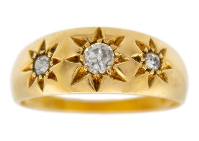 Lot 58 - An Edwardian 18ct hallmarked gold diamond set three-stone gypsy ring.