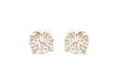 Lot 43 - A pair of 0.66ct diamond ear studs set in 18ct yellow and white gold.