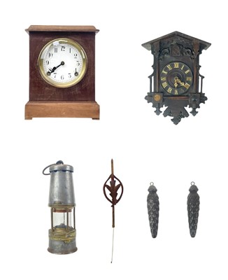 Lot 587 - A Black Forest cuckoo wall clock.