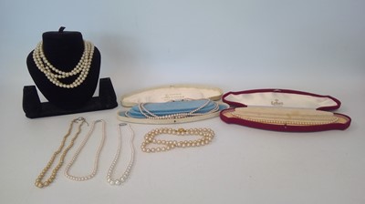 Lot 90 - Seven pearl necklaces, two boxed.
