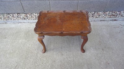 Lot 63 - An Occasional Table with a Detachable Tray....
