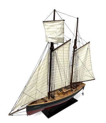 Lot 65 - A twin-masted, six-sleeved model of a schooner...