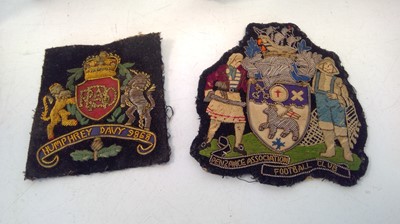 Lot 89 - Sports trophies and two embroidered local...