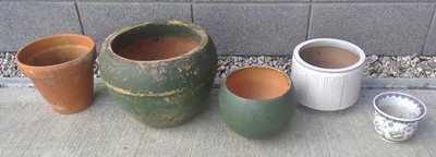 Lot 146 - Five Terracotta and Glazed Flower pots. The...