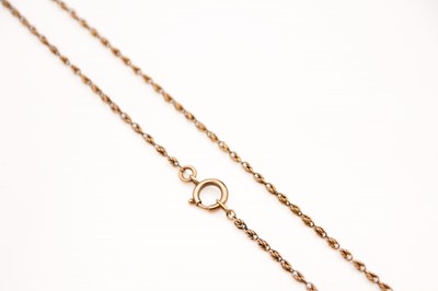 Lot 9 - A 9ct rose gold rope twist necklace.