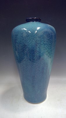 Lot 297 - A Tall Blue Glaze Vase. The Vase measures 43cm...