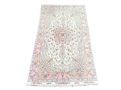 Lot 611 - Silk carpet.
