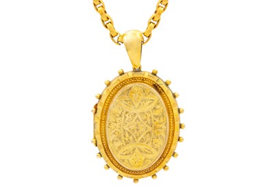 Lot 31 - A Victorian 9ct gold choker and gold locket pendant.