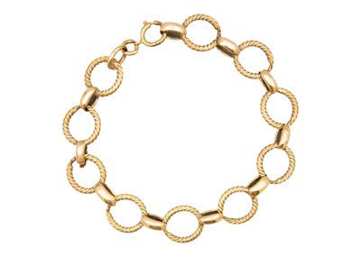 Lot 44 - A 9ct (tested) oval and circular twist link bracelet.