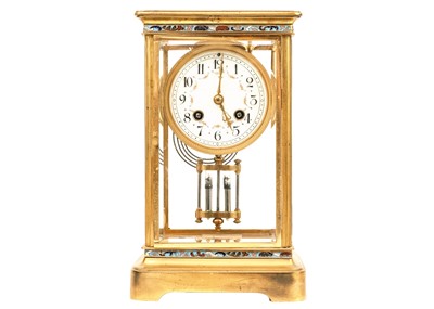 Lot 385 - A French four-glass gilt metal mantel clock.