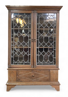 Lot 703 - An oak bookcase