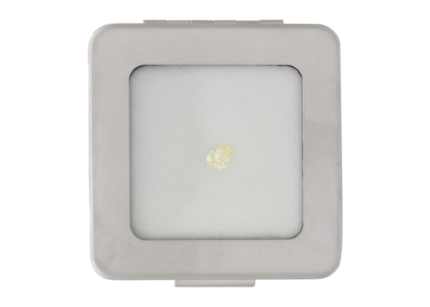 Lot 37 - A 0.60ct pear cut natural fancy yellow VVS2 diamond with GIA certificate.