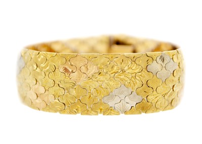 Lot 46 - An Italian 18ct bi-colour articulated bracelet.