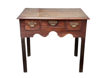 Lot 638 - A George III mahogany lowboy.