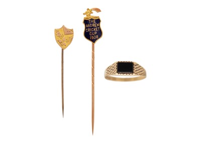 Lot 64 - A Edwardian 9ct and blue enamel stick pin, a 9ct head pin and a 9ct and onyx ring.
