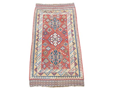 Lot 614 - A Kelim rug.