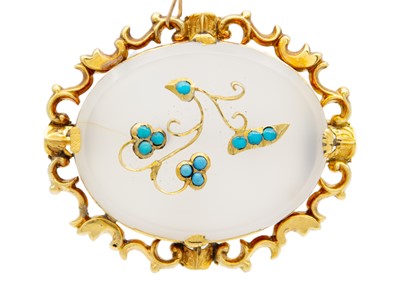 Lot 78 - A Victorian gold-mounted chalcedony and turquoise floral spray oval brooch.