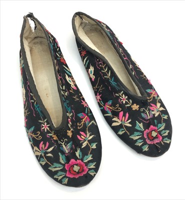 Lot 192 - A pair of Chinese silk embroidered black...
