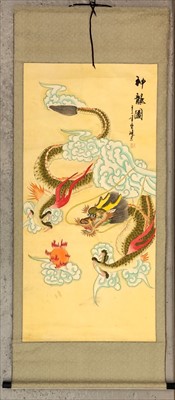 Lot 311 - A Chinese scroll depicting a dragon chasing...