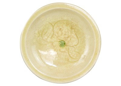 Lot 676 - A Chinese celadon glazed bowl.