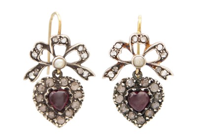 Lot 236 - A rare 19th-century pair of rose cut diamond, garnet and seed pearl set heart and ribbon earrings.
