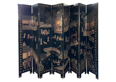 Lot 707 - A Chinese black lacquered screen, early 20th century.