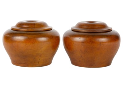 Lot 267 - A pair of Chinese fruitwood bowls and covers, Edo period.