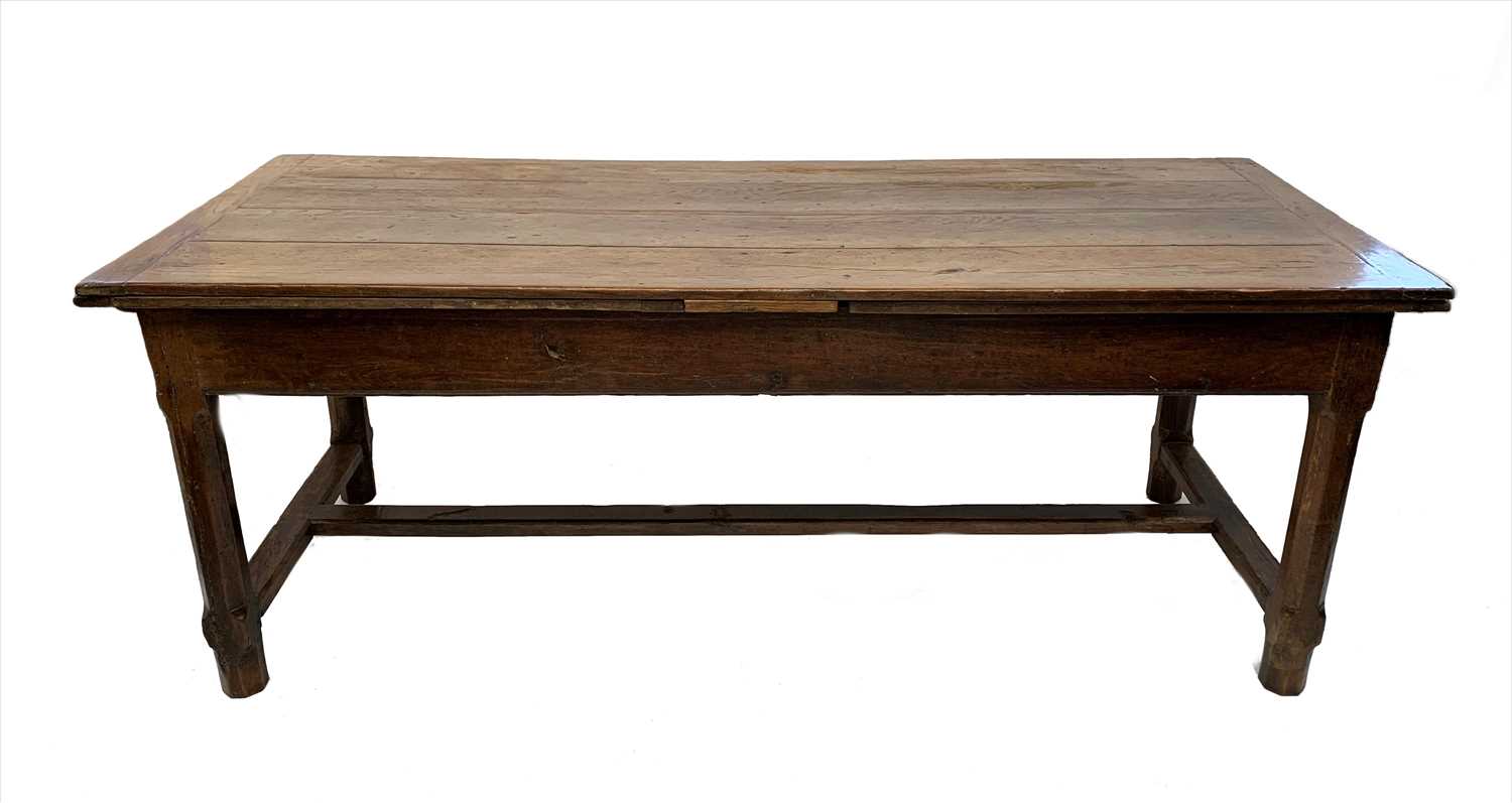 Lot 3475 - An early 18th century oak draw leaf refectory...