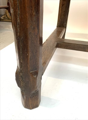 Lot 3475 - An early 18th century oak draw leaf refectory...