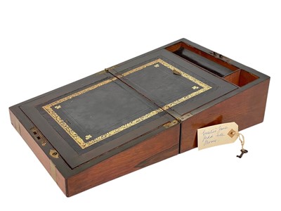 Lot 63 - A 19th century walnut and brass bound writing box.