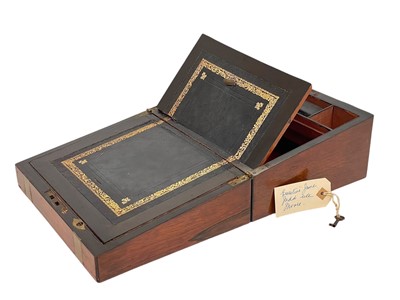 Lot 63 - A 19th century walnut and brass bound writing box.