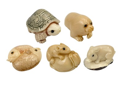 Lot 706 - Five Japanese tagua nut netsukes.