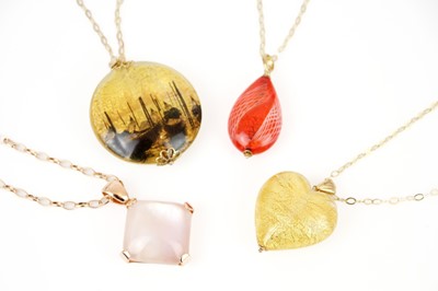 Lot 313 - Three Murano glass pendants with silver gilt mounts and neck chains.