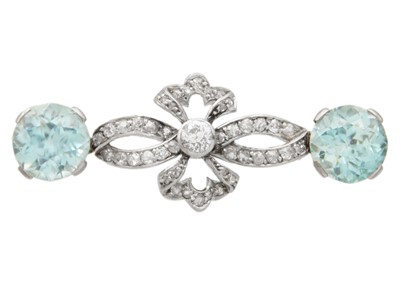 Lot 191 - An attractive early 20th-century diamond and blue zircon, white gold set brooch.