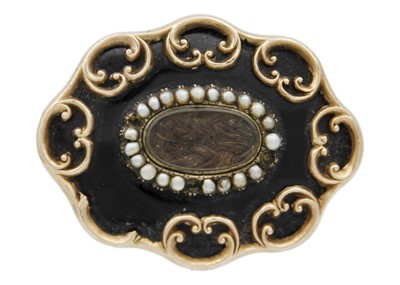 Lot 153 - A Victorian gold, black enamel, and seed pearl set memorial brooch.