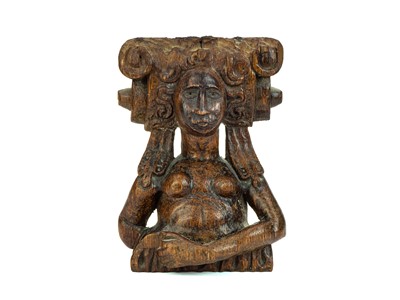 Lot 1071 - A carved oak female caryatid figure.