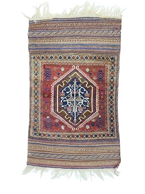 Lot 606 - A Belouch rug, mid 20th century.
