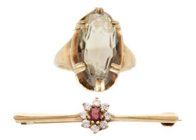 Lot 143 - A 9ct garnet and CZ cluster bar brooch, and a 9ct smoky quartz cocktail ring.