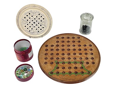 Lot 60 - An Edwardian solitare board.