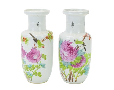 Lot 766 - A pair of Chinese porcelain rouleau vases, late 19th century.