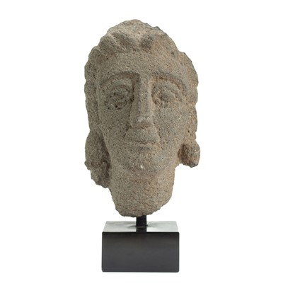 Lot 1111 - A Gallo-Roman carved stone head.