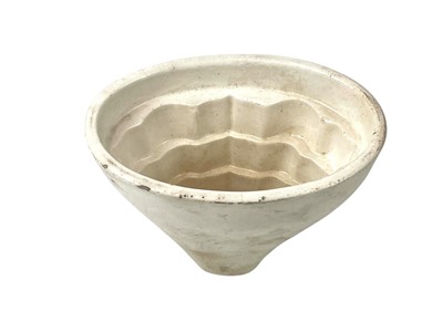 Lot 7 - A collection of eight various pottery jelly moulds.