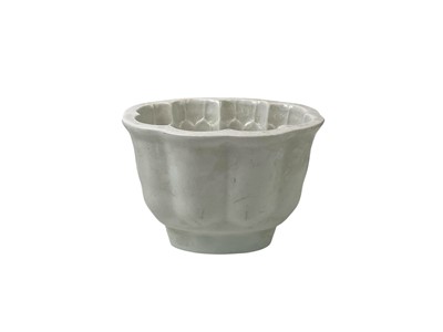 Lot 7 - A collection of eight various pottery jelly moulds.